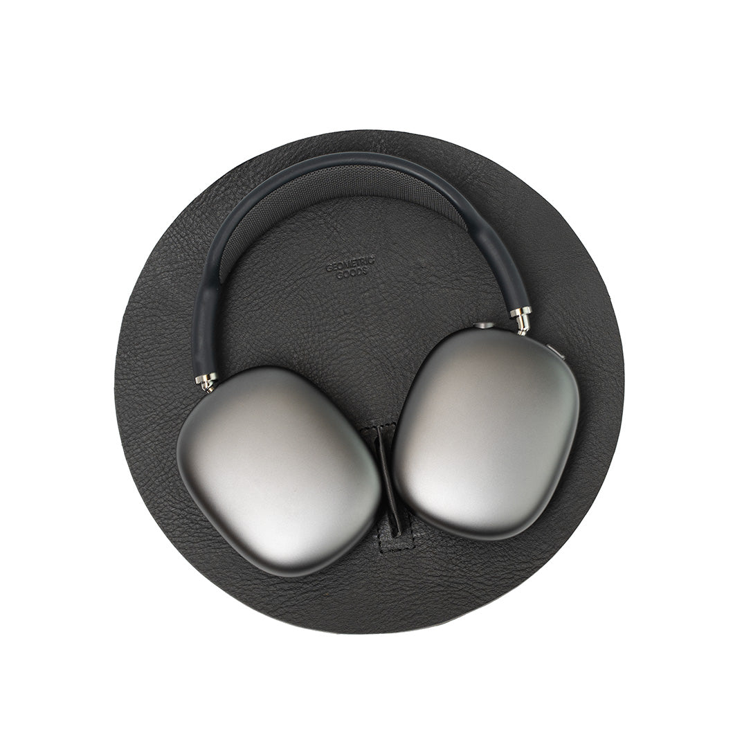 Top view of AirPods Max Rest Station in premium black leather, handcrafted in Europe.