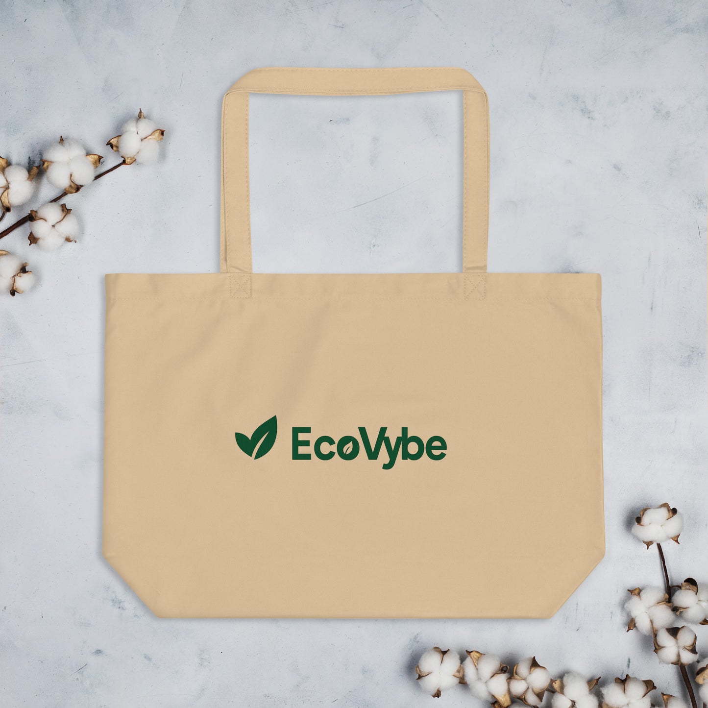 EcoVybe beige organic tote bag flatlay – eco-friendly cotton.