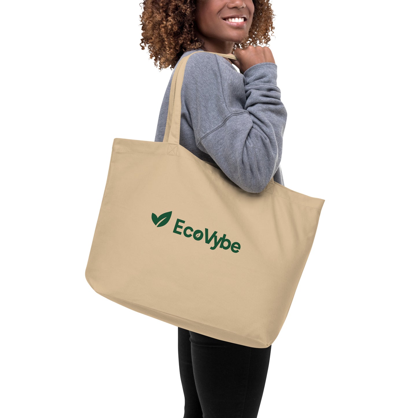 EcoVybe sustainable beige tote bag on shoulder – reusable shopper.