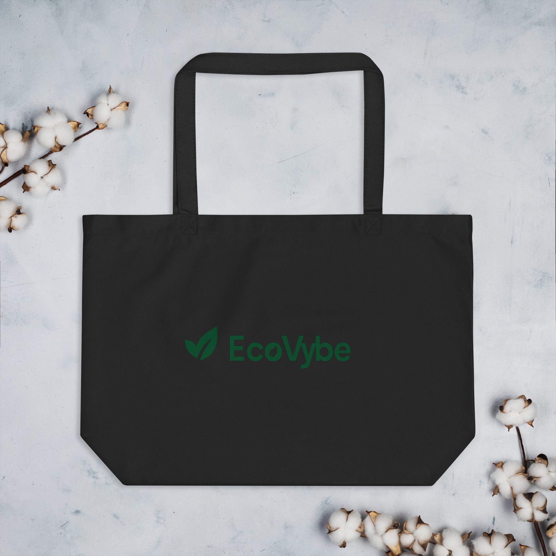 EcoVybe black organic tote bag flatlay – eco-friendly cotton.