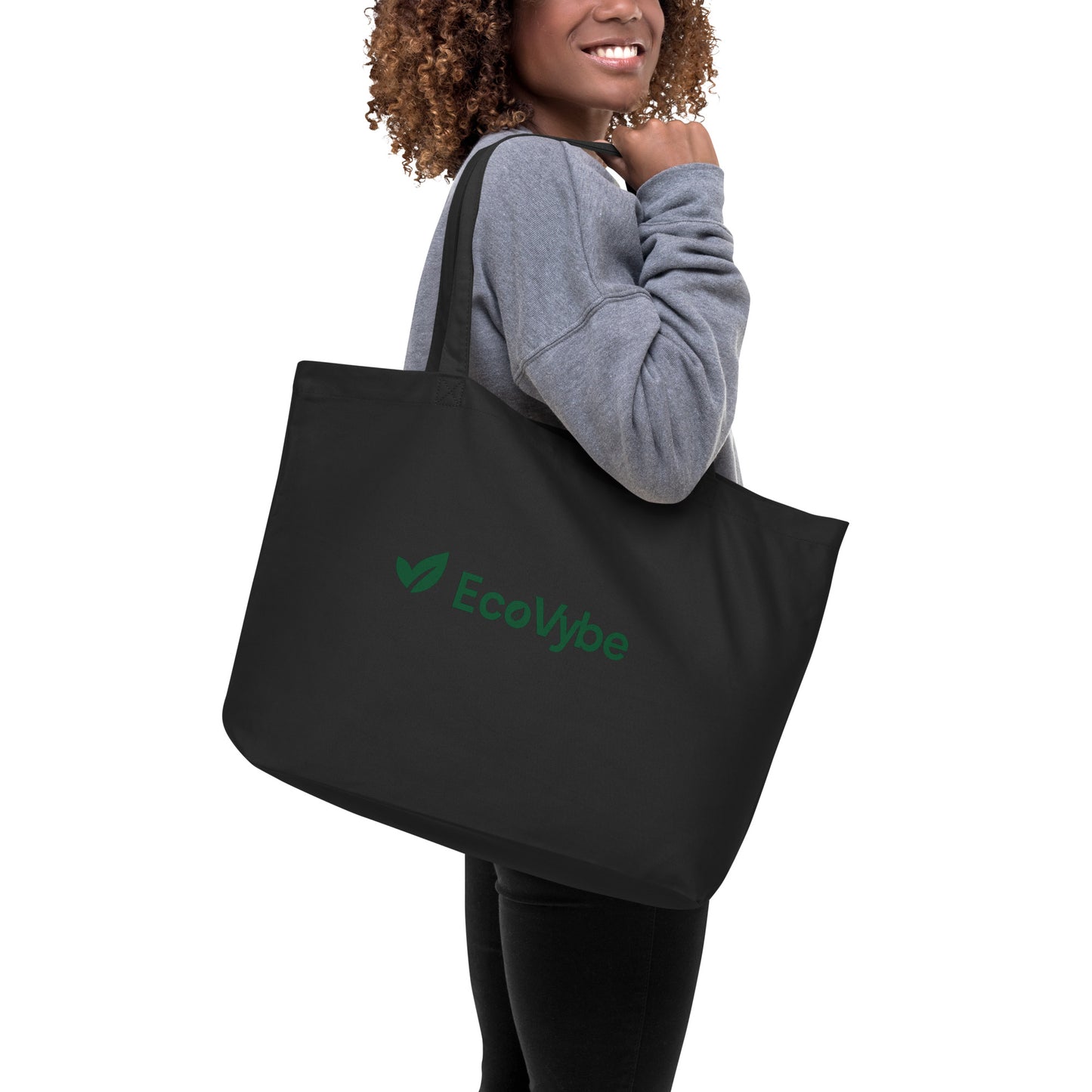 EcoVybe black organic cotton tote bag worn by model.
