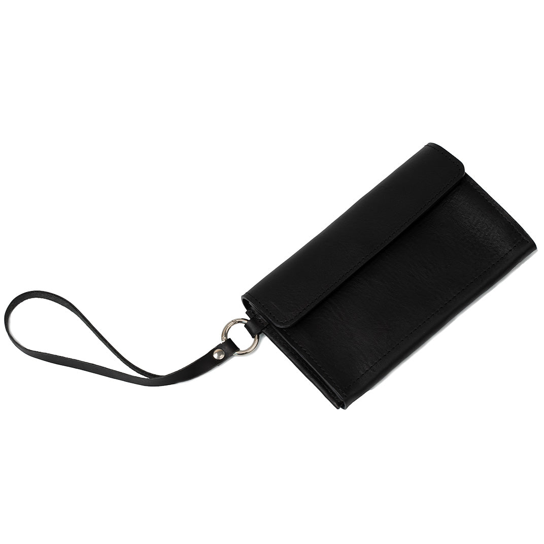 Black leather AirTag wallet with detachable wrist strap, closed view on white background.