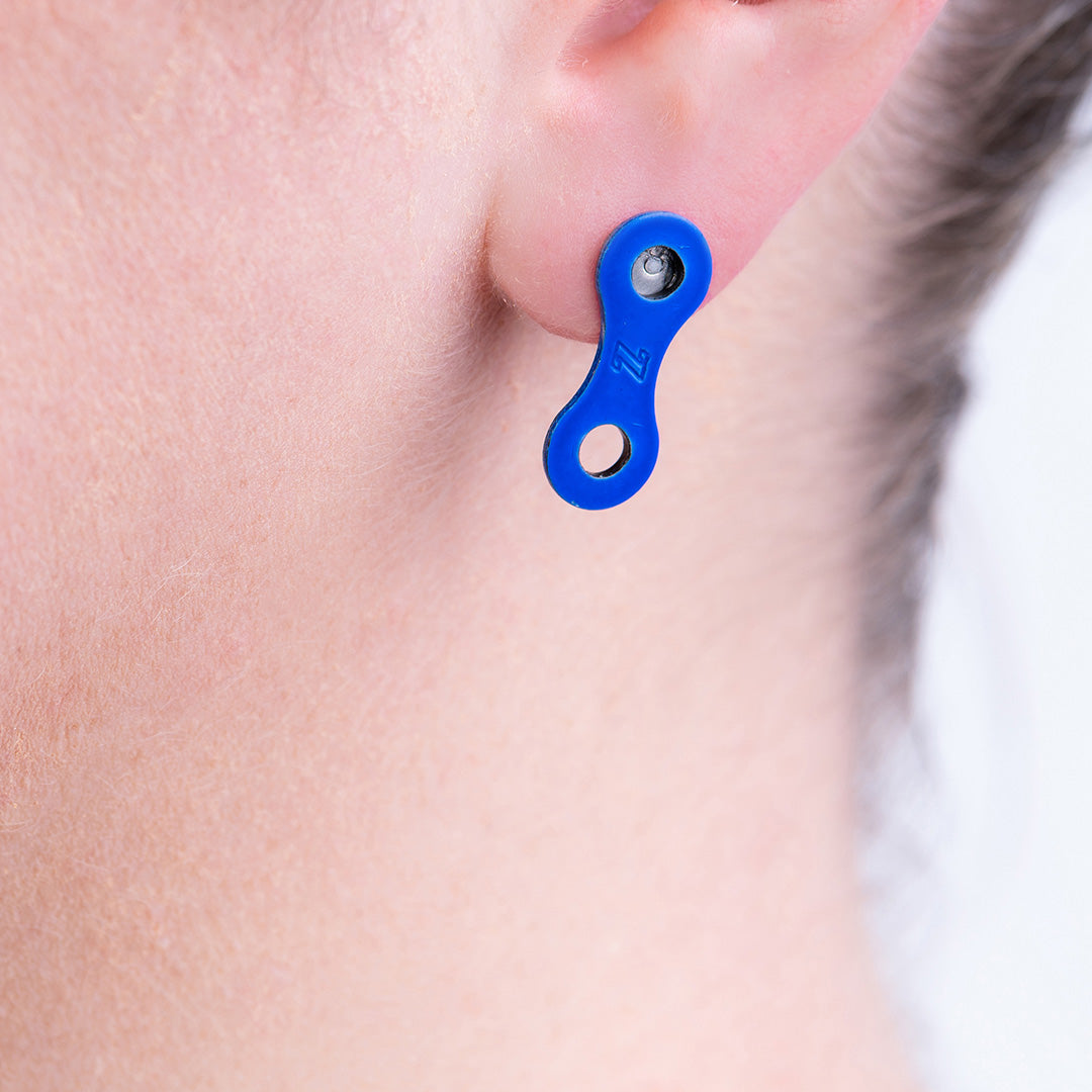 Eco-friendly Lone Rider blue bike chain stud earrings made from recycled bicycle chain links.
