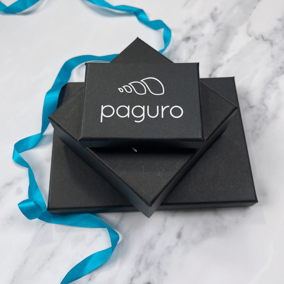 Lone Rider bike chain stud earrings presented in luxury Paguro eco-friendly gift box.
