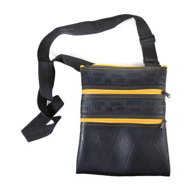 Maggie Special recycled rubber vegan crossbody with yellow zipper and adjustable strap.
