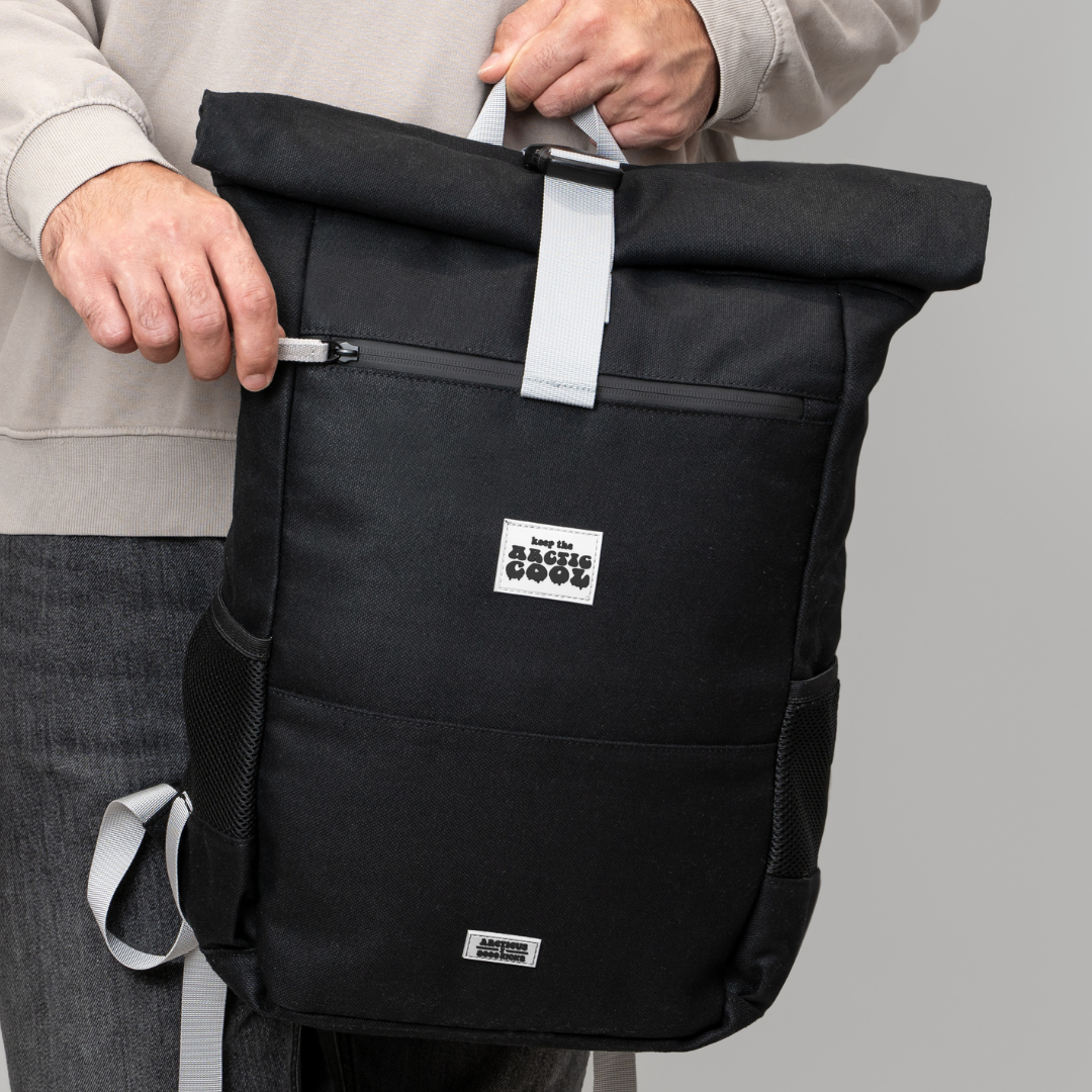 Polar Explorer Backpack black hemp waterproof eco-friendly backpack, held by person, front display.