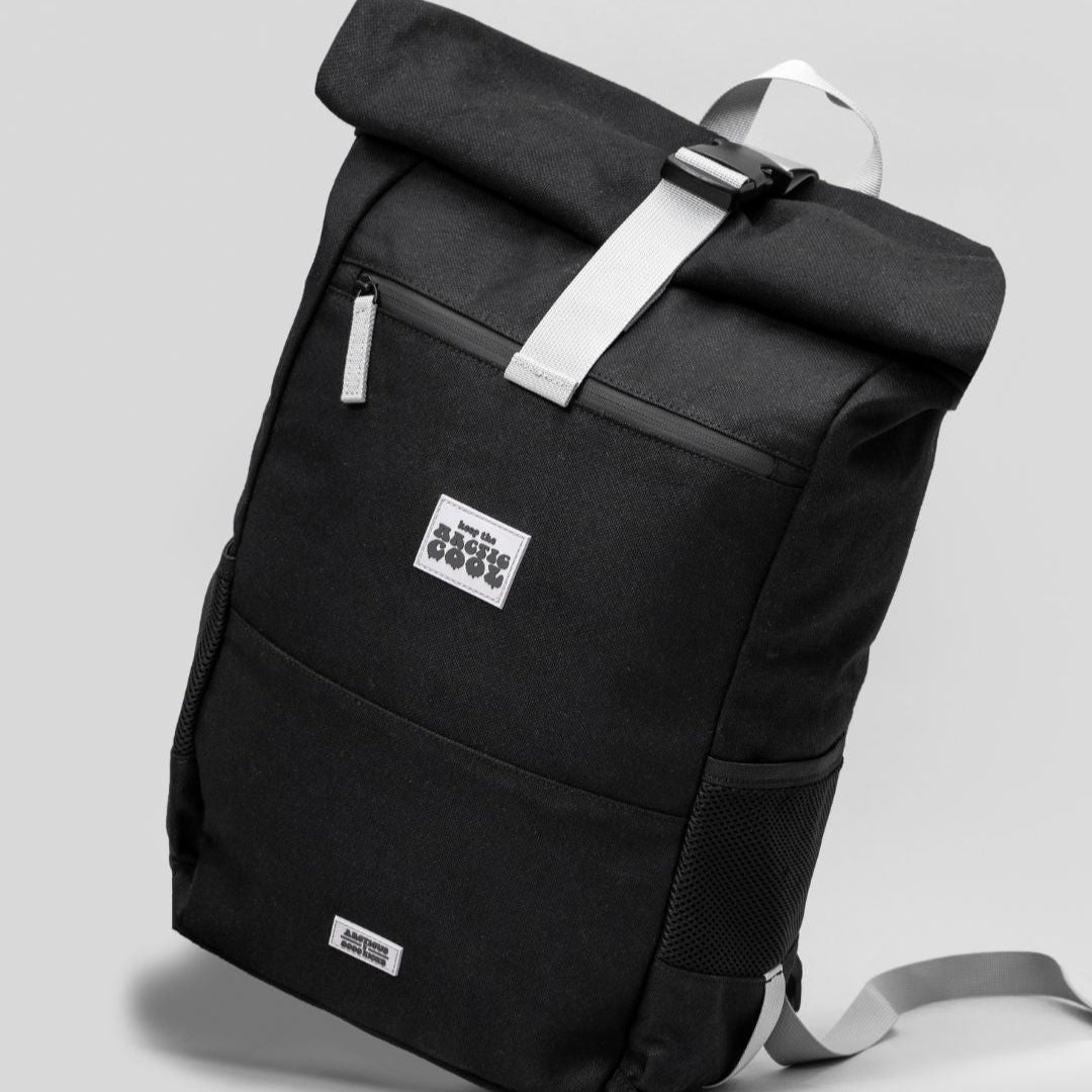 Polar Explorer Backpack black eco-friendly hemp material, side angle view, sustainable everyday backpack.