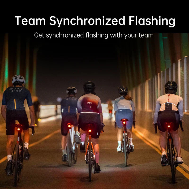 Cyclists using Smart Matrix Bike Tail Light with synchronized flashing in group ride.